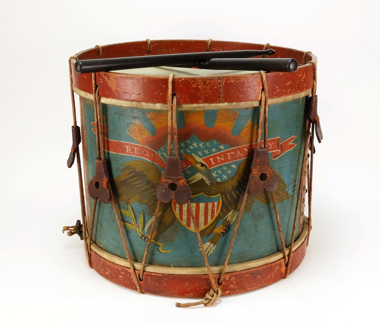 Civil War drum: 
Circa 1864 Civil War regulation painted rope tension drum, with the original rope and nine original leather ears, plus a pair of sticks ($7,995).